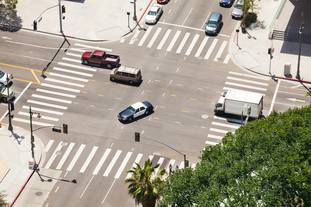 Aerial view of intersection with car turning left Los Angeles, CA